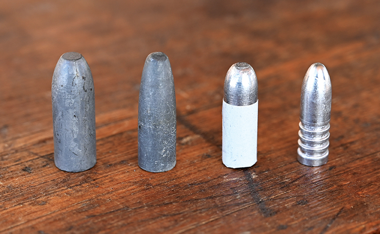 Slugs for heavy benchrest rifles (left to right): a .55 caliber, 960-grain two-piece H.V. Perry; a .50 caliber, 740-grain, two-piece Warner; a .45 caliber, 530-grain Bresien and a .40 caliber 420-grain Brooks.